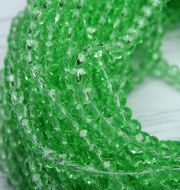 БП020НН34 Хрустальные бусины Светло-зеленый прозрачный 3х4 мм, 70-75 шт. фото 1