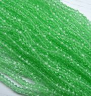БП020НН34 Хрустальные бусины Светло-зеленый прозрачный 3х4 мм, 70-75 шт. фото 3